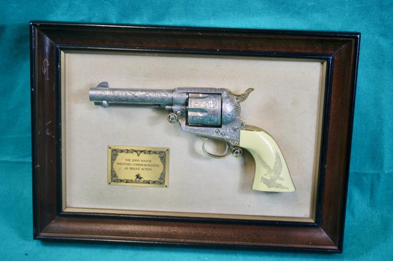 Replica of John Waynes Colt M1875 Peacemaker. ( Franklin Mint )